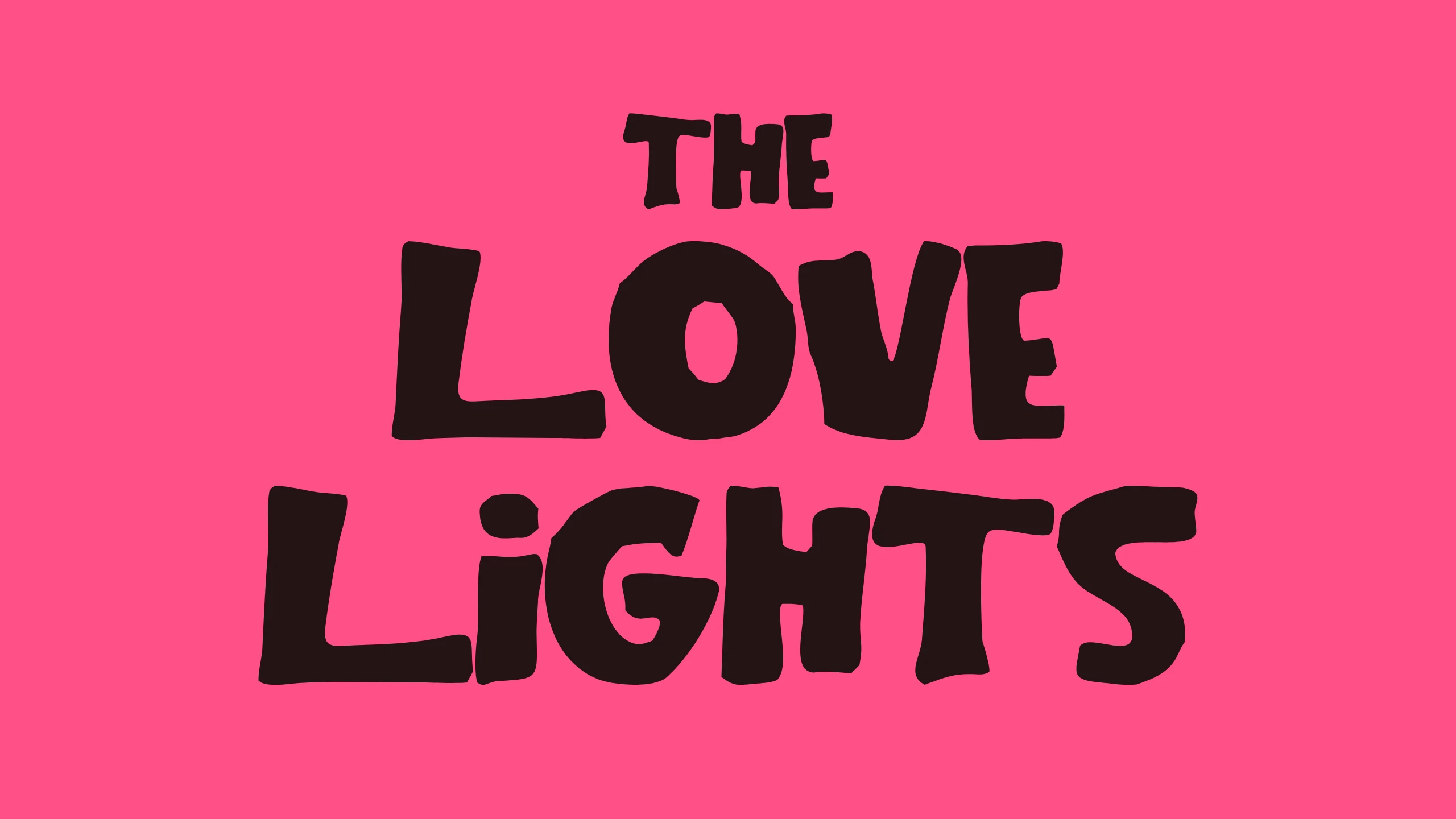 THE LOVE LiGHTS set in the typeface with the dotted i, dark brown on Luminous Pink